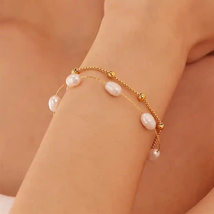 Pearl Grace Armbånd i forgyldt ædelstål med ferskvandsperler – Promiz.dk